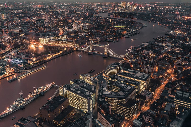 An aerial image of London at dawn.