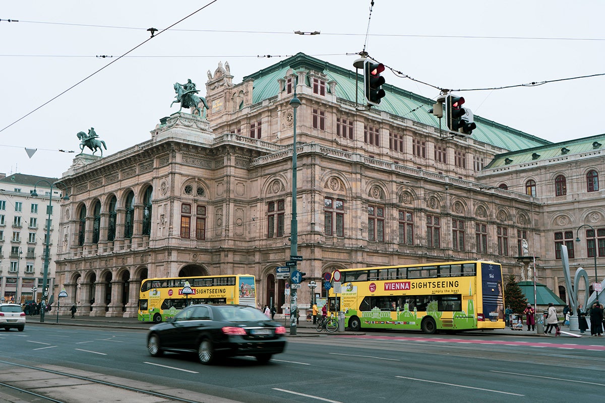 Buses and cars on a street in Vienna
