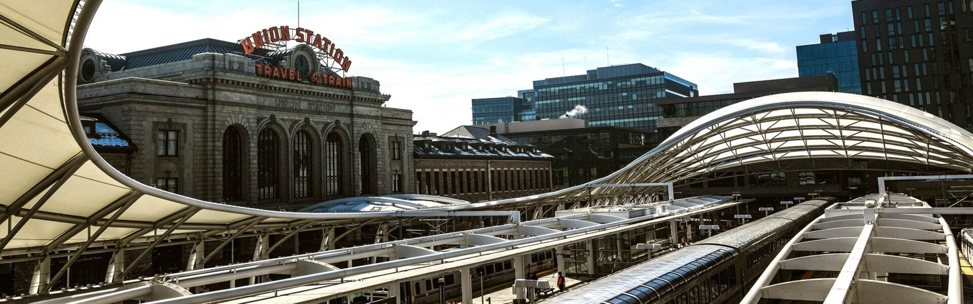 A train in front of Union Station in Denver, CO.