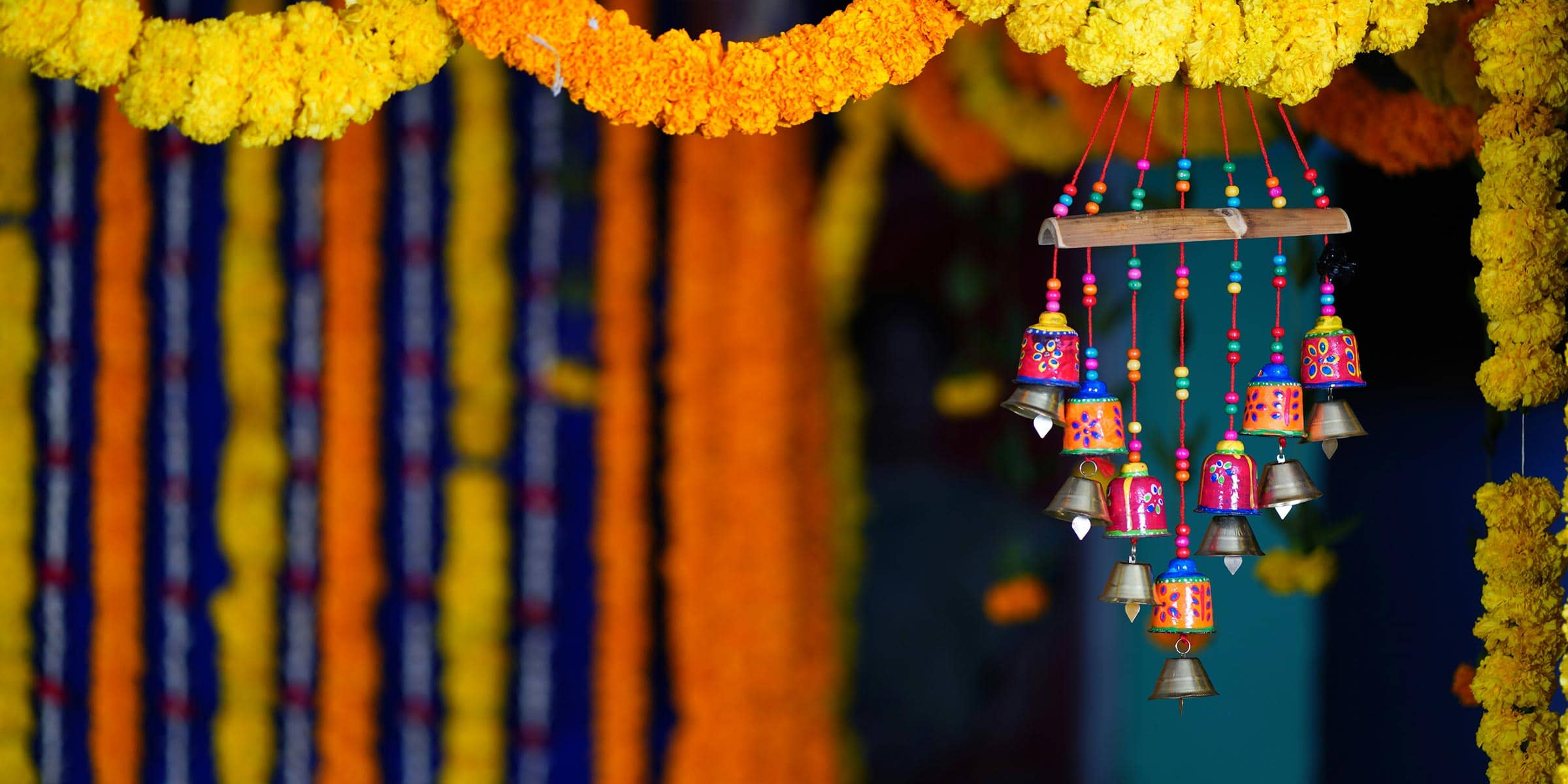 Colorful streamers & a wind chime hanging from the ceiling.