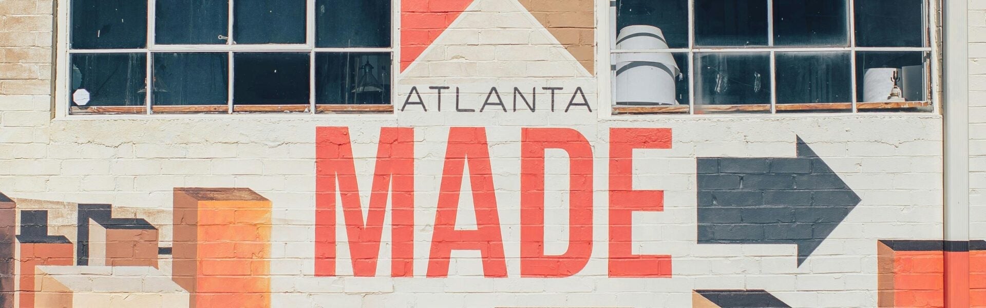 A mural on a warehouse wall that says "Atlanta Made."