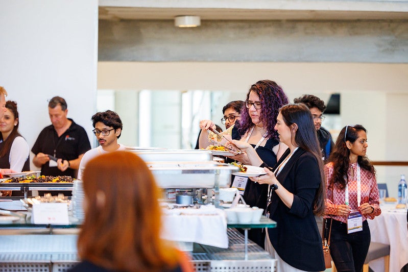 People in a buffet line.