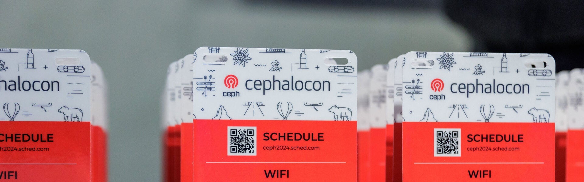 Rows of attendee name badge holders.