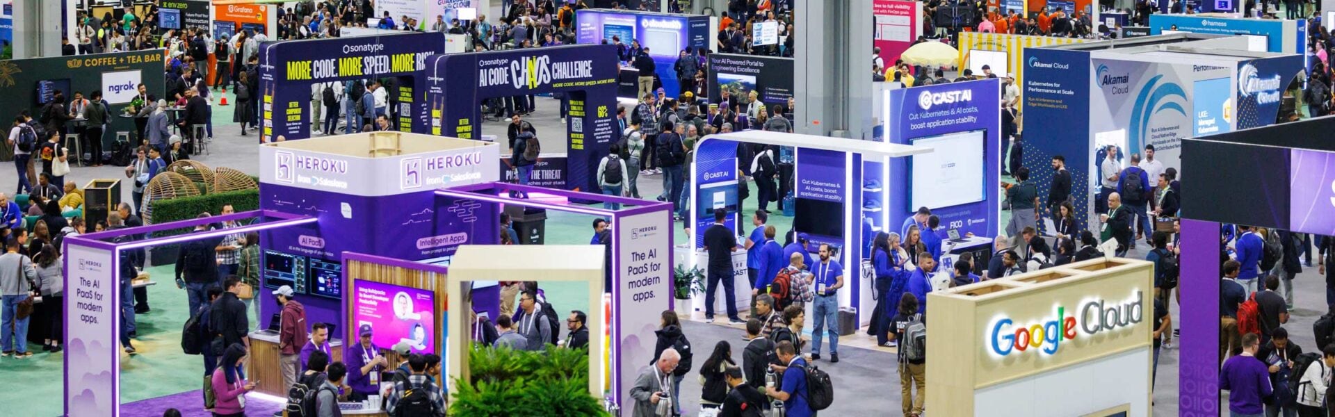 Attendees explore sponsor booths and exhibits in the busy conference solutions showcase hall.